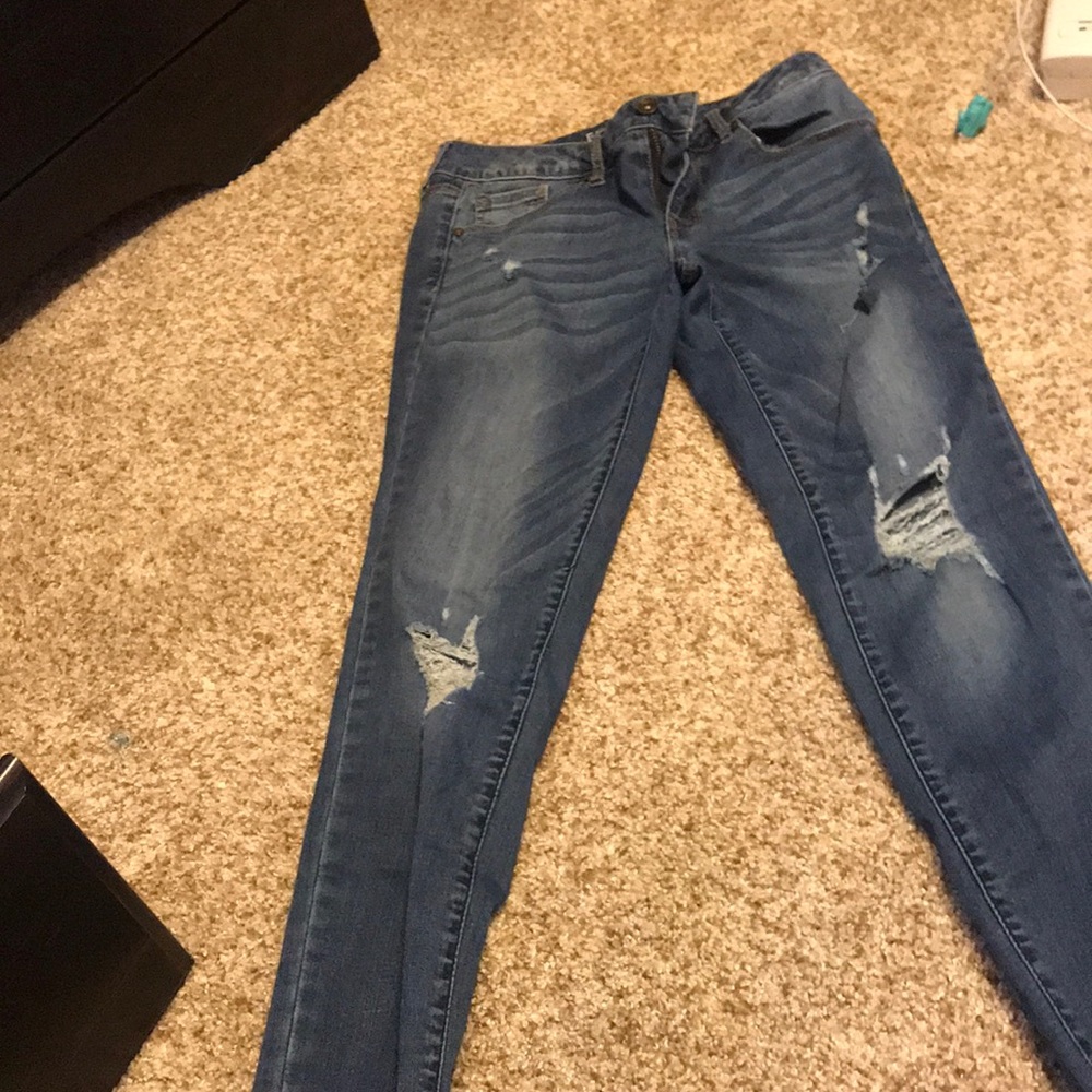 blue ripped jeans